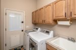 Indoor Laundry Room With Backyard Access